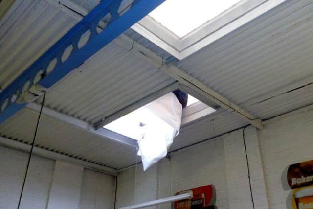 A broken roof light at Whiteghyll Plastics Ltd in Bradford, where worker Richard Perry fell to his death. The company has been fined Â£120,000 for breaching Section 2(1) of the Health and Safety at Work Act 1974. Picture: HSE/PA Wire
.