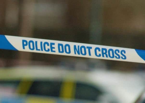 Police have closed a number of roads in Sheffield after reports of man with a gun.