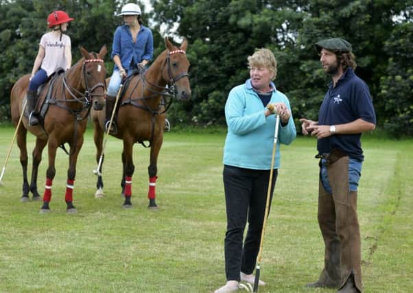 Sue Westwood with Argentinian Polo coach Matteus Jolly at Well Hill Hill Farm, Bramham Park, and Harley and Caroline Haycox who are being coached.  Picture by Bruce Rollinson.
