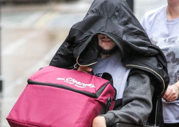 Wheelchair bound Thomas McMeekin arrives at Leeds Crown Court . Picture: Ross Parry Agency