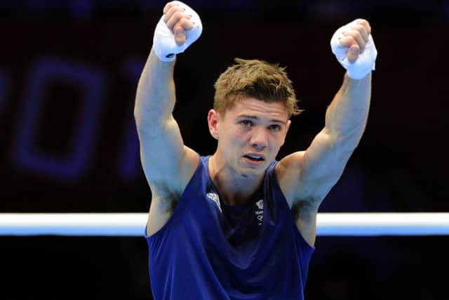 Golden moment: Luke Campbell celebrates defeating Ireland's John Joe Nevin in the Men's Boxing Bantam 56kg Final at the ExCeL Centre, London, on day 15 of the London 2012 Olympics.