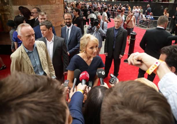 JK Rowling speaks to media upon arriving for the opening gala performance of Harry Potter and The Cursed Child, at the Palace Theatre in London.