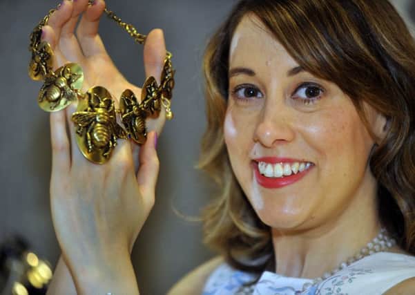 Gemma Redmond from Wigan with a Bee Necklace made  in Russian Gold Plate made by Joseff who made jewellery for Hollywood films The Wizard of Oz and Gone with the Wind.