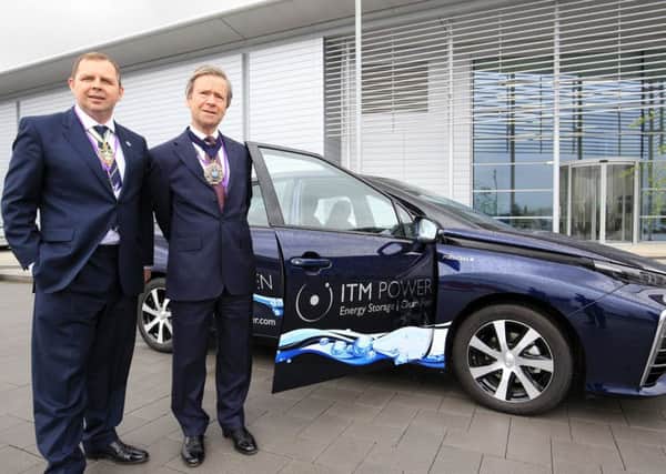 The Lord Mayor of London, Jeffrey Evans, visited Sheffield as guest of the Master Cutler Craig McKay. They are pictured at The Factory of the Future Factory 2050 with a hydrogen fuel car. Photo: Chris Etchells