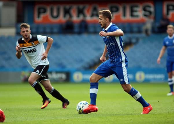 Almin Abdi makes a run in midfield for Sheffield Wednesday.