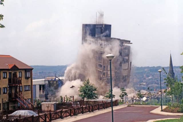 The last block of to be demolished comes down in June 1993