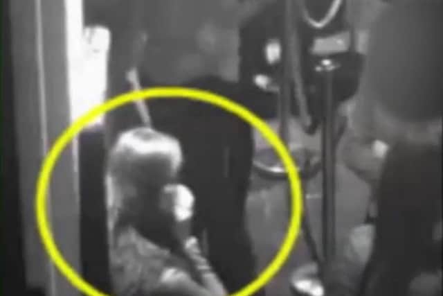 CCTV footage of India Chipchase on her phone outside NB's nightclub in Northampton