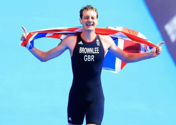 Alistair Brownlee wins gold in 2012.