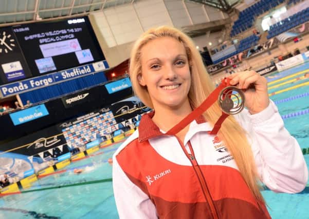 Sheffield swimmer Ellie Faulkner with her Commonwealth Games medals
