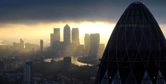Canary Wharf at sunrise  Photo: Stefan Rousseau/PA Wire
