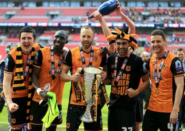 (Left-right) Hull City's Harry Maguire, Mohamed Diame, David Meyler, Ahmed Elmohamady and Alex Bruce celebrate after the Championship Play-Off Final at Wembley.