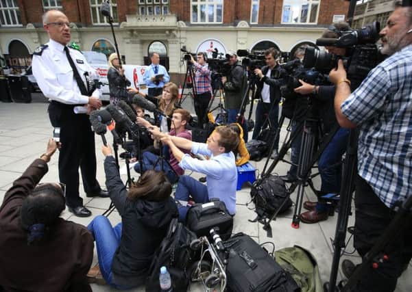Scotland Yard's head of counter-terrorism Assistant Commissioner Mark Rowley outside New Scotland Yard,  after a 19-year-old man was arrested on suspicion of murder after a woman was killed and five people injured