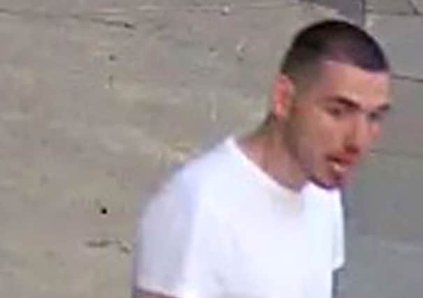 Police want to speak to this man in connection with a serious assault in Huddersfield