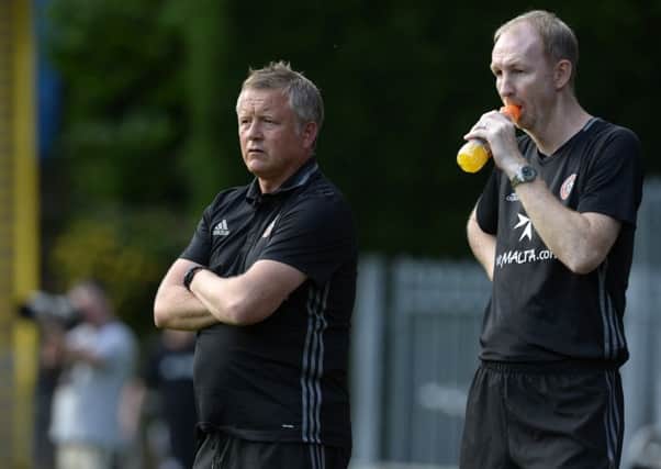 Sheffield United manager Chris Wilder, left, and assistant Alan Knill pictured at a close season friendly with 
FC Halifax Town (Picture: Bruce Rollinson).