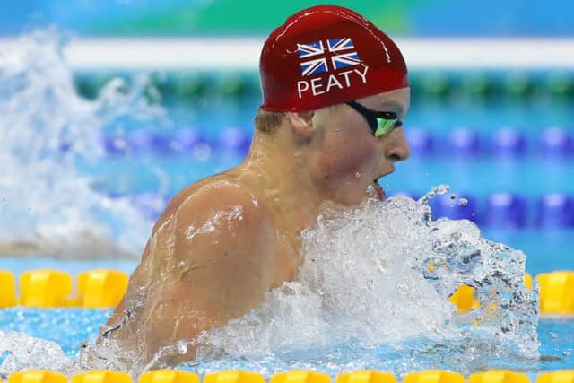 Great Britain's swimming record-breaker Adam Peaty competes in the men's 100m breaststroke semi-final