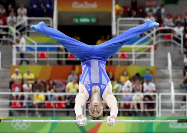 Great Britain's Nile Wilson, of Leeds, during the men's individual all-round qualification gymnastics