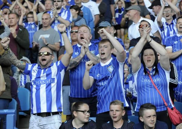 Fans like these Sheffield Wednesday supporters are unwaveringly loyal, researchers have found