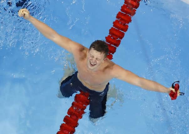 Britain's Adam Peaty wins the 100m breaststroke gold medal during the swimming competitions at the 2016 Summer Olympics. (AP Photo/Morry Gash)