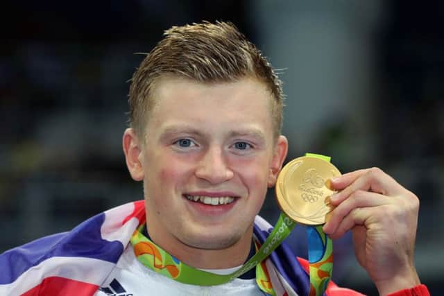 Great Britain's Adam Peaty with his gold medal following the Men's 100m breaststroke final at the Maria Lenk Aquatics Centre during the second day of the Rio Olympics Games, Brazil.. Photo: Owen Humphreys/PA Wire