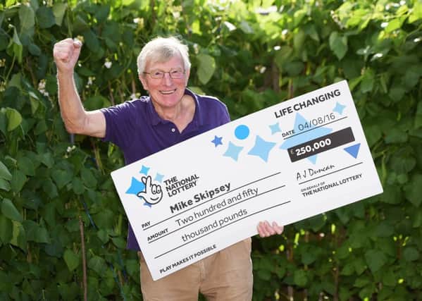 Mike Skipsey with his winning cheque
