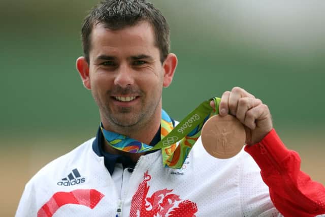 Great Britain's Ed Ling with his bronze medal following the men's trap final