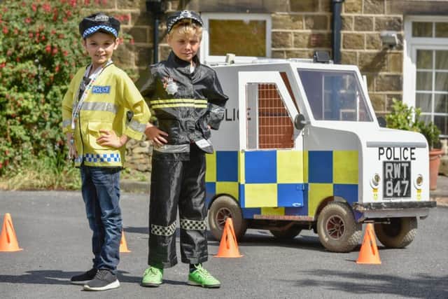 Frankie, 9, and brother Jonah Robinson, 7. Picture: Ross Parry Agency
