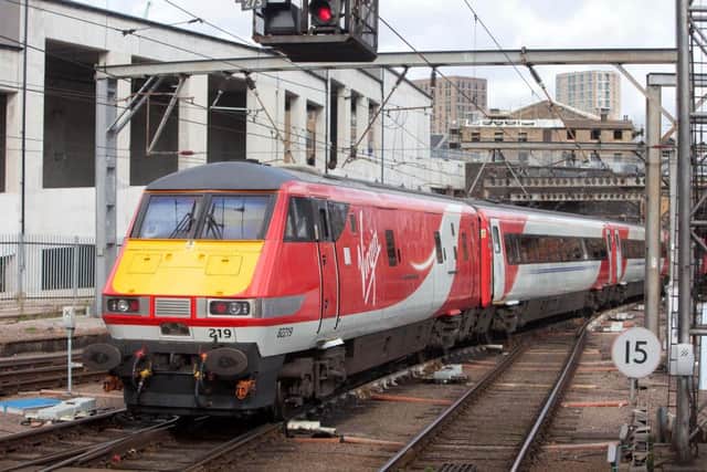 Virgin East Coast workers have voted to strike in a dispute over jobs, working conditions and safety