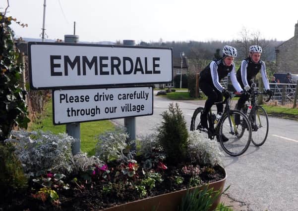 Jonathan and Alistair Brownlee on a training ride through ITVs Emmerdale set. Picture by Tony Johnson.