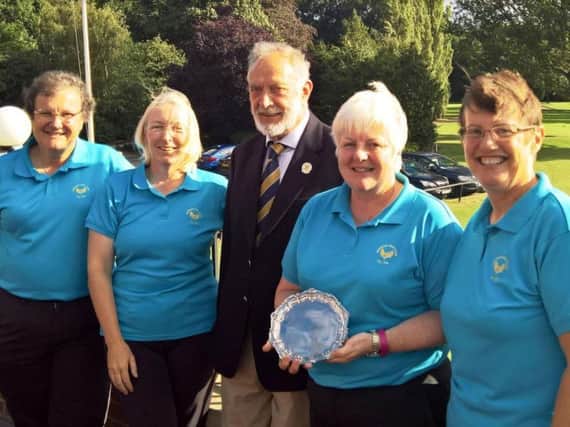 Oakdale A, winners of the Ladies Silver Team Championship, l-r, Karen Leake, Penny Baxter, Patsy Rochester and Joyce Slater, with Harrogate Union president Robin Elias.