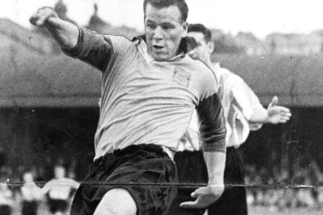 Leeds United legend John Charles, seen here in action in 1962, would cost a fortune in today's market.