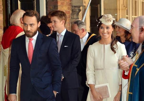 File photo dated 23/10/13 of Pippa and James Middleton with Earl Grosvenor (centre), whose father, the billionaire landowner the Duke of Westminster, has died aged 64.