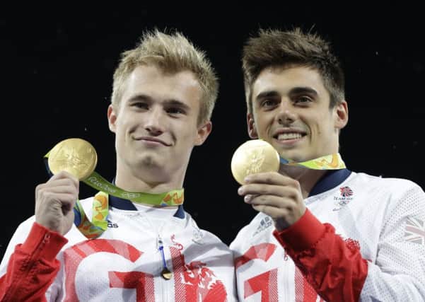 Jack Laugher and Chris Mears celebrate their Olympic gold.