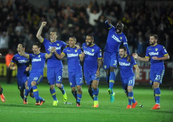 Leeds United players celebrate after winning on penalties at Fleetwood.
Pictures: Tony Johnson