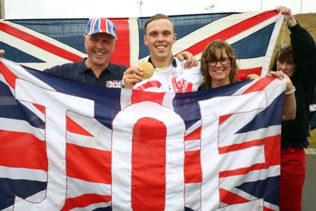 Great Britain's Joe Clarke celebrates gold in the kayak (K1) men's final