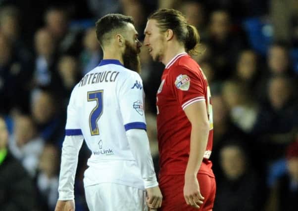 Leeds United's Mirco Antenucci head to hewad with Bristol City's Luke Ayling last January. Picture by Tony Johnson