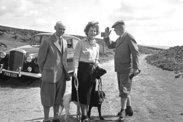 Harold Macmillan (right), with the Duchess of Devonshire and EE Hey, the Duke of Devonshire's agent, on Barden High Moor during a grouse-shooting holiday in Yorkshire.