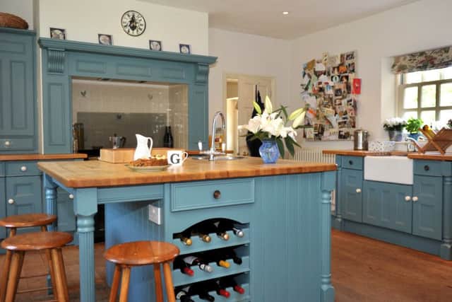 Georgie Pridden
Georgie painted the cream kitchen blue for a cosier effect.
