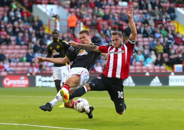 Billy Sharp goes close under pressure. (Picture: Simon Bellis/Sportimage)