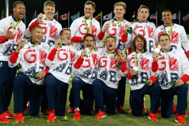 Great Britain rugby union players with their silver medals