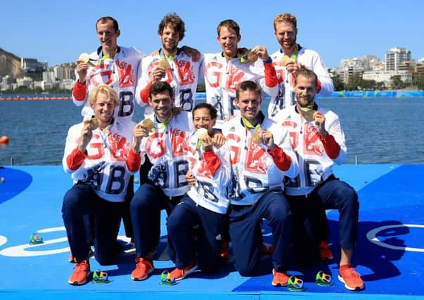 Great Britain's Scott Durant, Tom Ransley, Matt Gotrel, Paul Bennett, Matt Langridge, William Satch, cox Phelan Hill, Andrew Triggs Hodge and Pete Reed celebrate with their Gold Medals in the Men's Eight final on the eighth day of the Rio Olympics Games, Brazil. Picture: Mike Egerton/PA Wire.