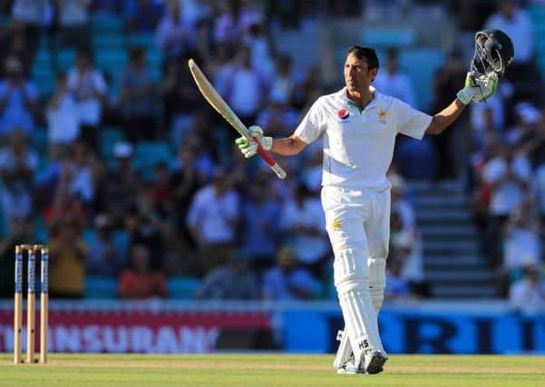 Pakistan's Younus Khan celebrates reaching his century during day two of the Fourth Investec Test match at The Kia Oval, London.