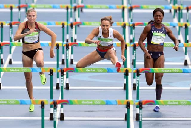 Great Britain's Jessica Ennis (centre) during the Women's Heptathlon 100m hurdles.