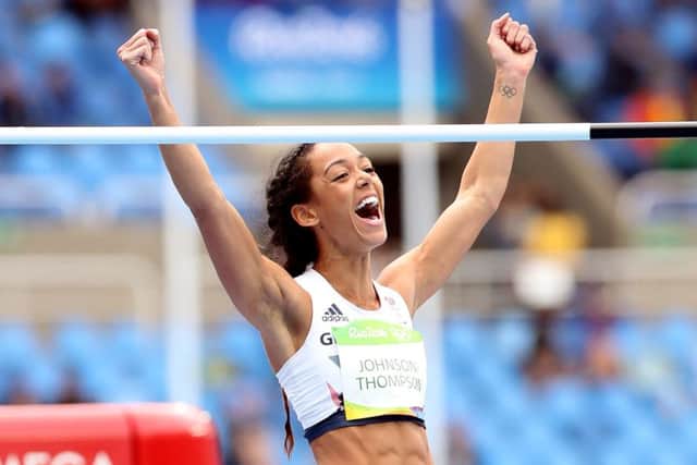 Great Britain's Katarina Johnson-Thompson is all smiles following a successful clearance during the women's heptathon high jump.