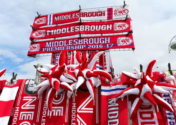 Scarves on sale prior to the Premier League match at the Riverside Stadium.