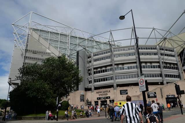 Fans make their way to the game ahead of the SkyBet Championship match at St James' Park, Newcastle. .
