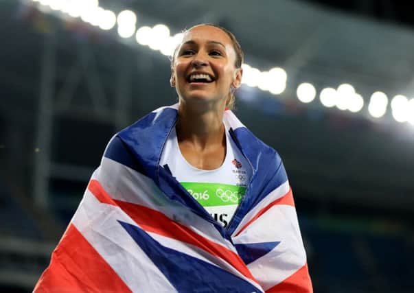 Great Britain's Jessica Ennis-Hill celebrates after winning silver