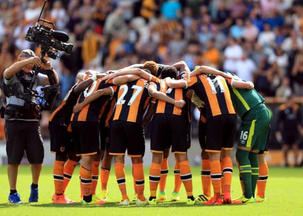 Hull City's players celebrate after the Premier League match at the KCOM Stadium, Hull.
