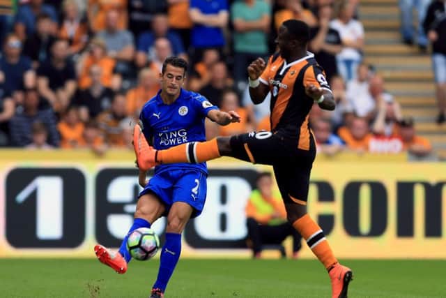 Leicester City's Luis Hernandez (left) and Hull City's Adama Diomande battle for the ball during the Premier League match at the KCOM Stadium, Hull.