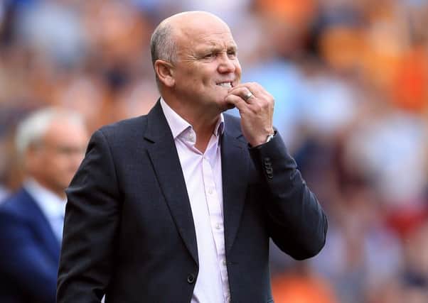 IN THE FRAME: Hull City caretaker manager Mike Phelan ponders his next move against the champions. Picture: Nigel French