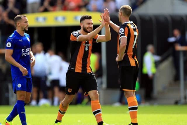 Hull City's Robert Snodgrass (left) and David Meyler celebrate their win over defending Premier League champions Leicester.